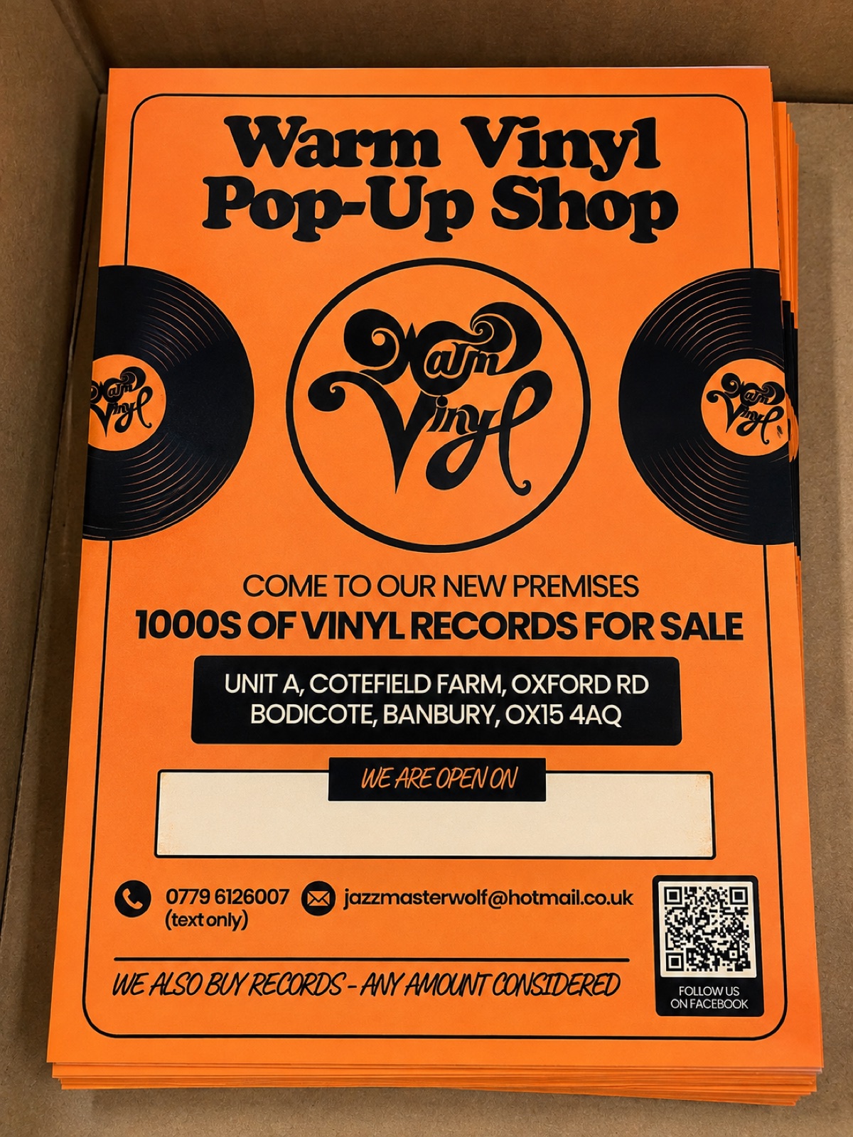 Bright orange promotional flyers